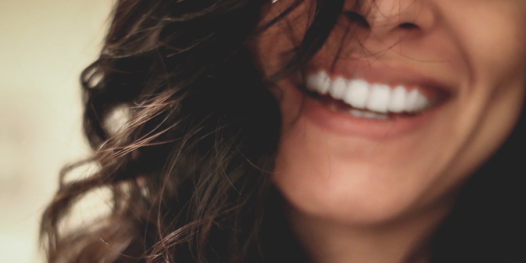 Image of a woman with a healthy smile
